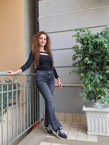 Jeans nero a trombetta con brillantini